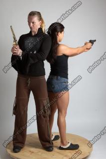 2021 01 OXANA AND XENIA STANDING POSE WITH GUNS (6)